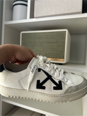 White Leather Sneakers with Black Arrow Logo